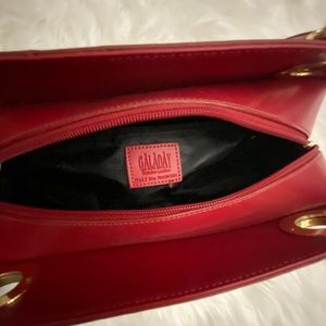 Galaday red purse. Pre-owned in excellent condition.